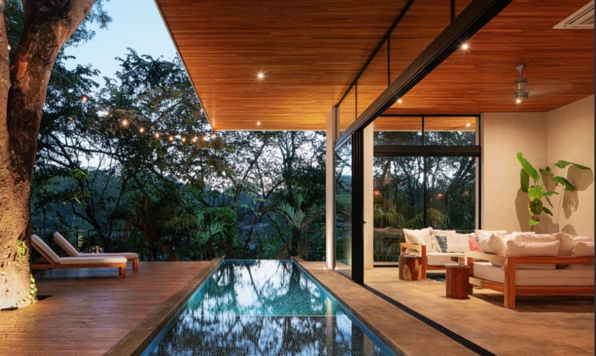 Casa Tranquila — jungle villa with infinity pool at dusk
